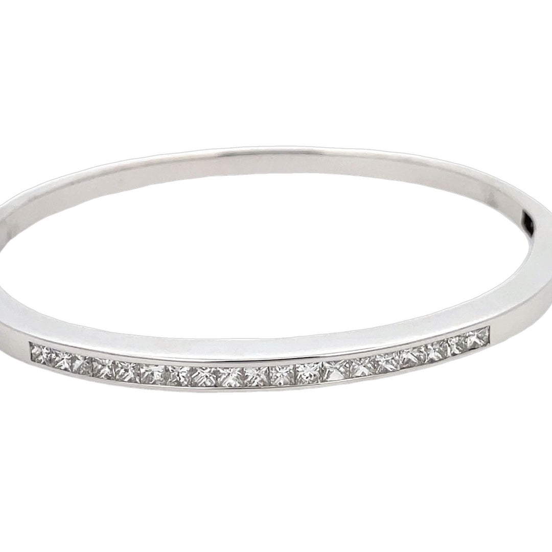 Bangle in 18K WG  with channel set princess cut diamonds.  D1.55ct.t.w.