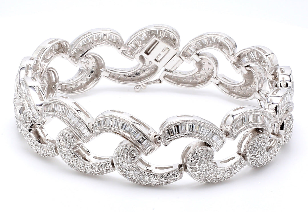 7"" Antique style bracelet in 18K WG with baguette & round diamonds.  D4.50ct.t.w.