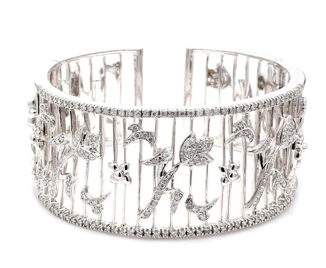 Tulip flower design cuff in 18K WG with round diamonds.  D1.40ct.t.w.