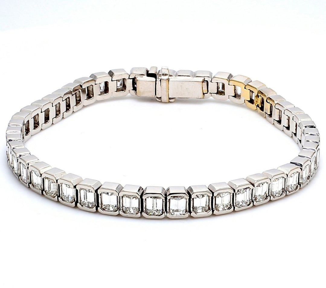 7"" Tennis bracelet in 18K WG with emerald cut diamonds.  D8.22ct.t.w.