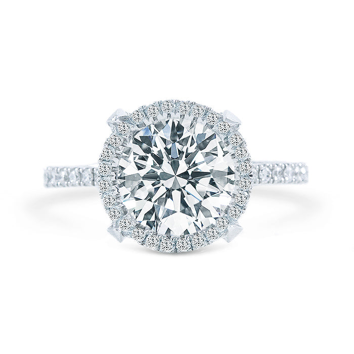 Halo semi-mount in 18K WG with round diamonds.  D0.56ct.t.w.