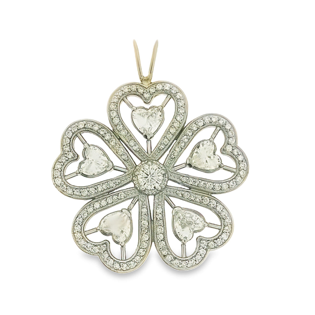 Clover-shaped heart pendant with milligrain accents, pave set rounds and prong set heart shaped diamonds.  D2.09ct.t.w.