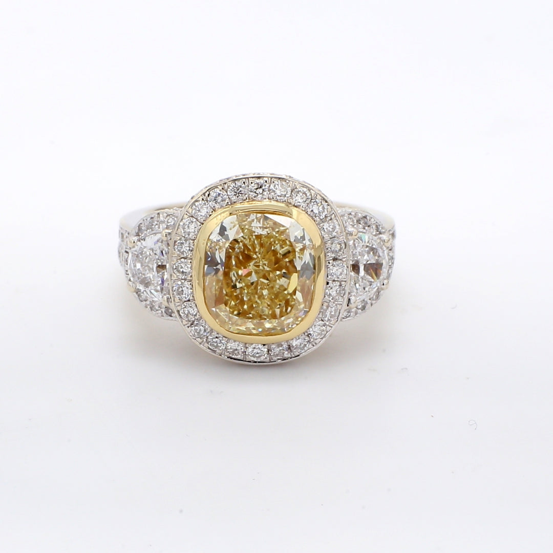 Halo semi-mount in 18K WG with miligrain details, prong set half moons and pave set round diamonds.  D2.03ct.t.w.