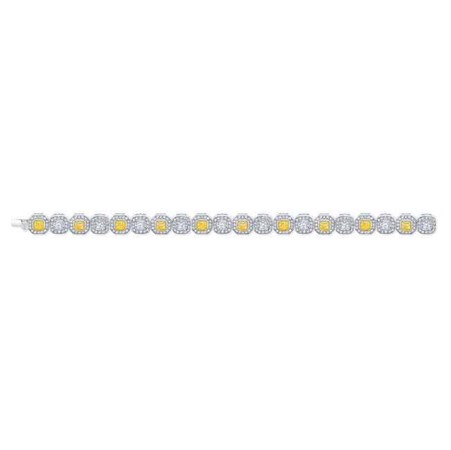 Designer halo bracelet in 18K WG with alternating fancy yellow and white cushion cut centers & pave set round diamonds.  D13.60ct.t.w.