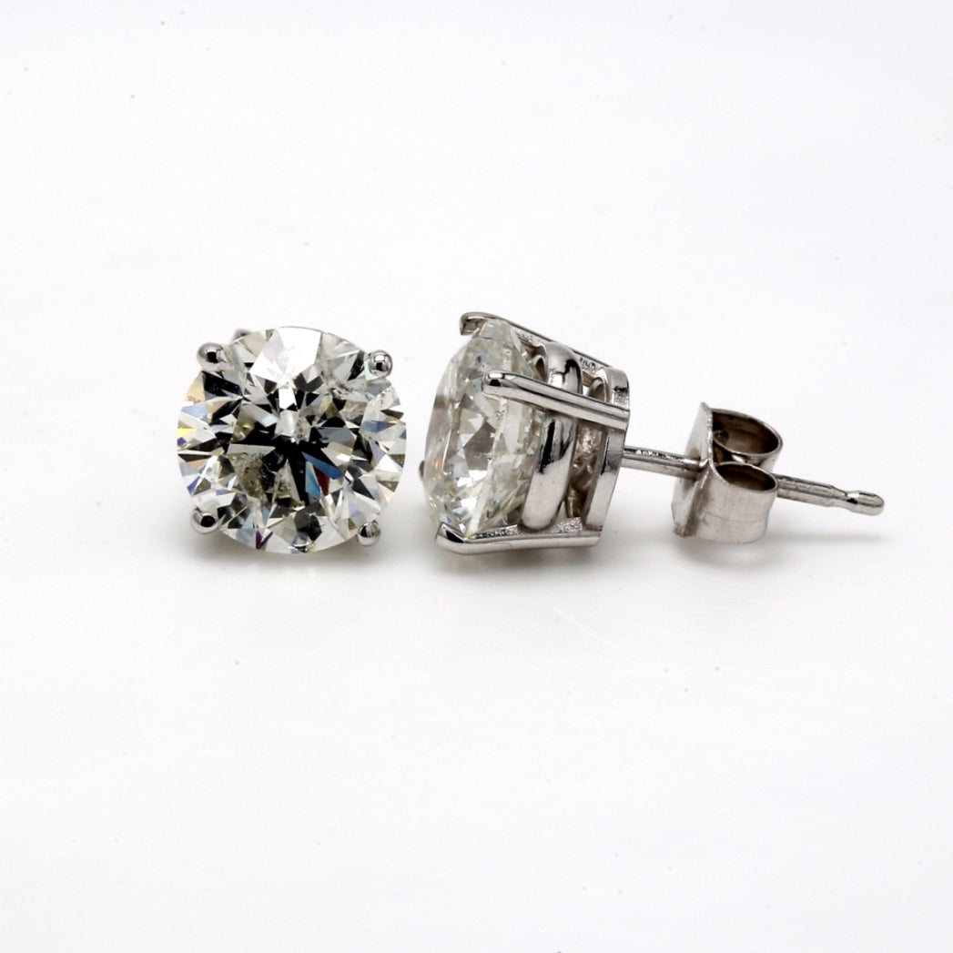 Push back stud earrings with 4 prong set USA certified G-H/SI3  round diamonds. D3.58ct.t.w.