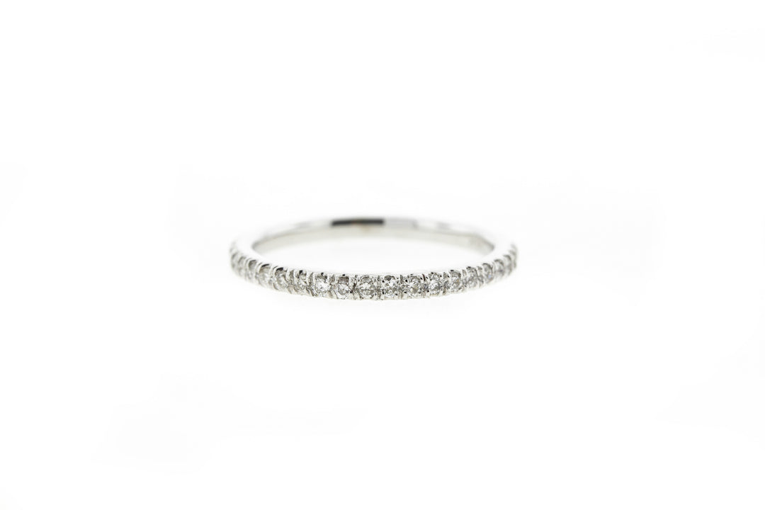 Eternity band with prong set round diamonds.  D0.54ct.t.w.