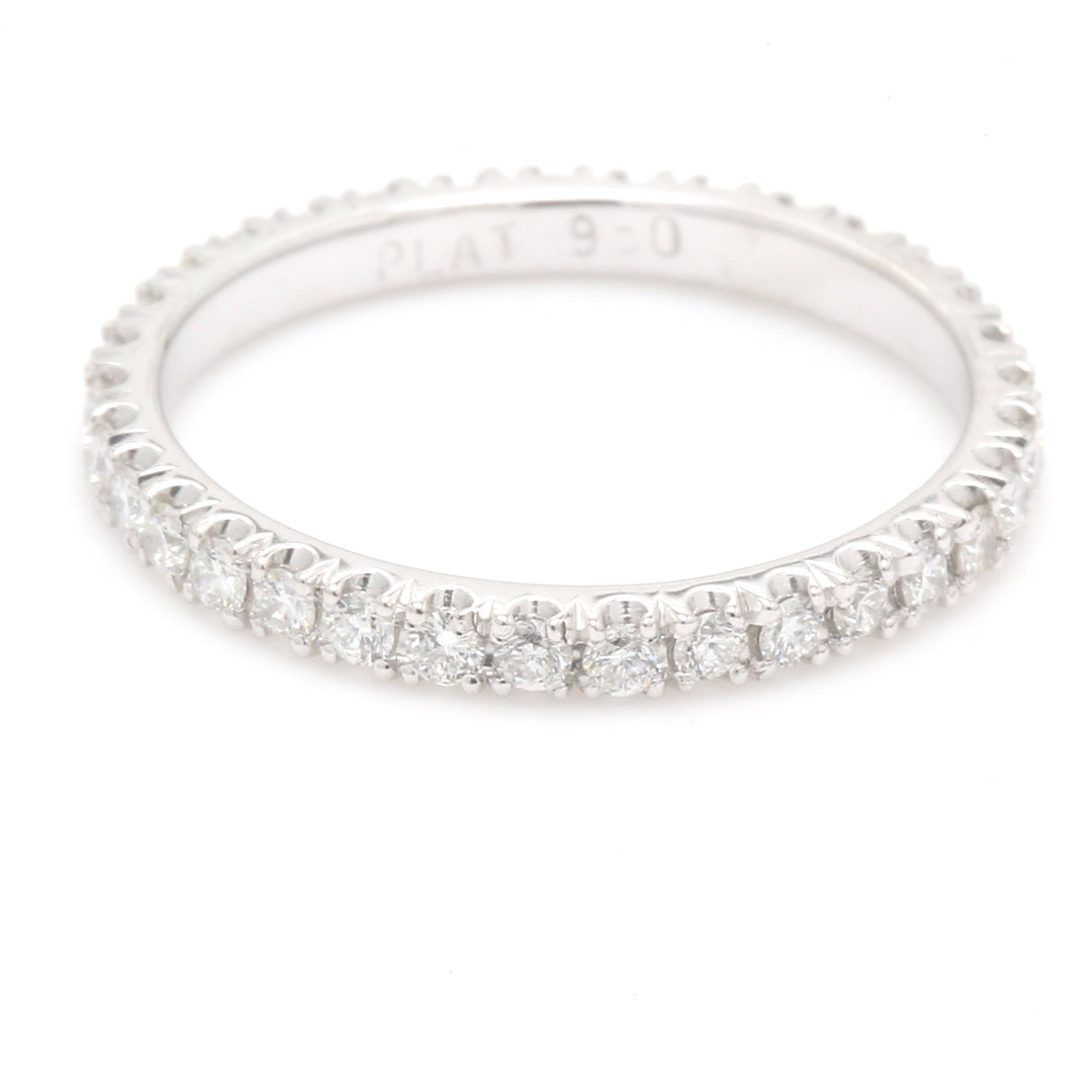 Eternity band in platinum with prong set round diamonds.  D0.52ct.t.w.