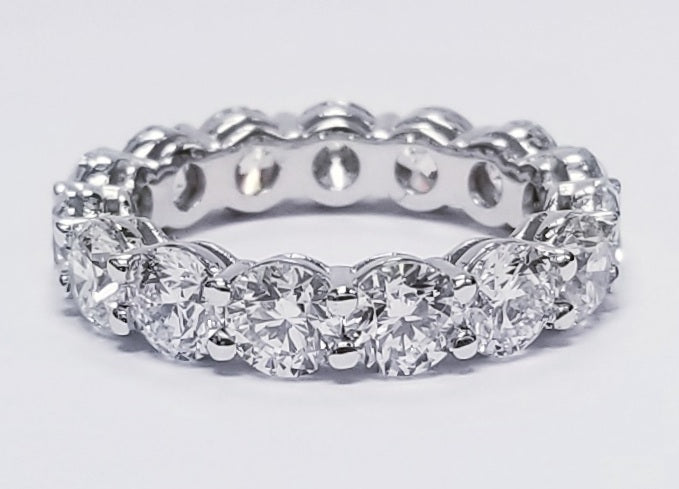 Eternity band in platinum with shared prong set (15) round diamonds.  D5.19ct.t.w.  Size 7.25