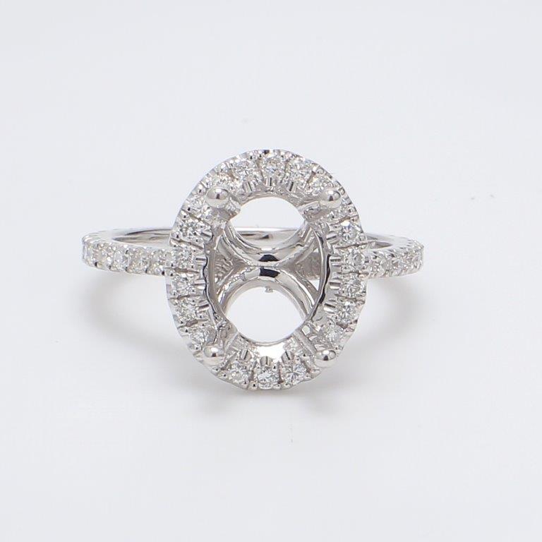 Halo semi-mount with shared prong set round diamonds.  D0.52ct.t.w.  Size 4.75