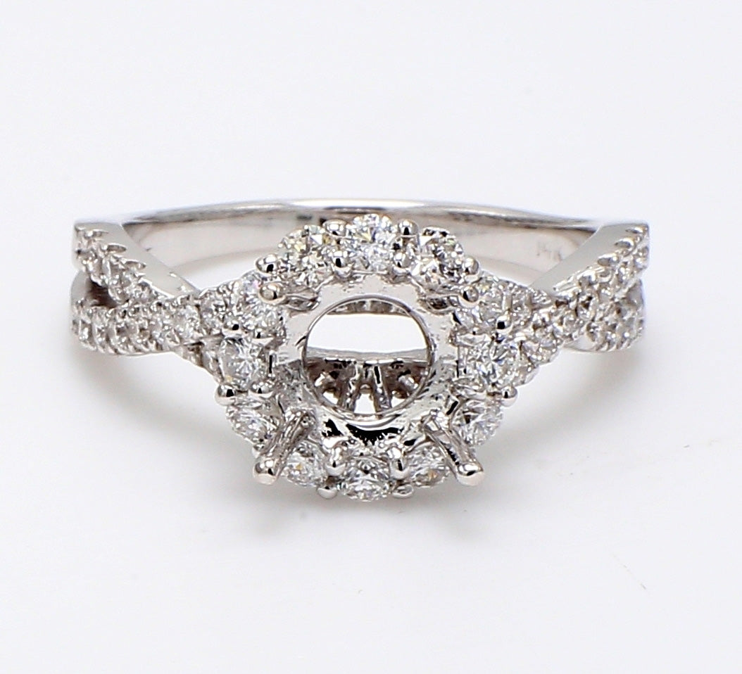 Halo split-shank semi-mount with 4-prong set round diamonds.  D0.72ct.t.w.