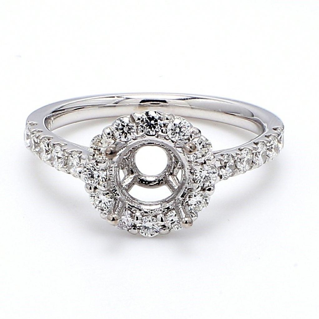 Halo semi-mount with shared prong set round diamonds.  D0.64ct.t.w.  Size 6.5