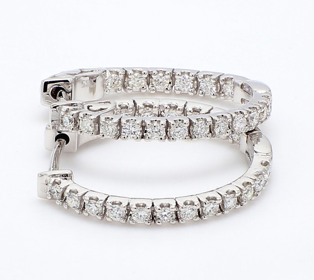 0.75"" Oval shape inside out hoop earrings with 4-prong set round diamonds.  D0.79ct.t.w.