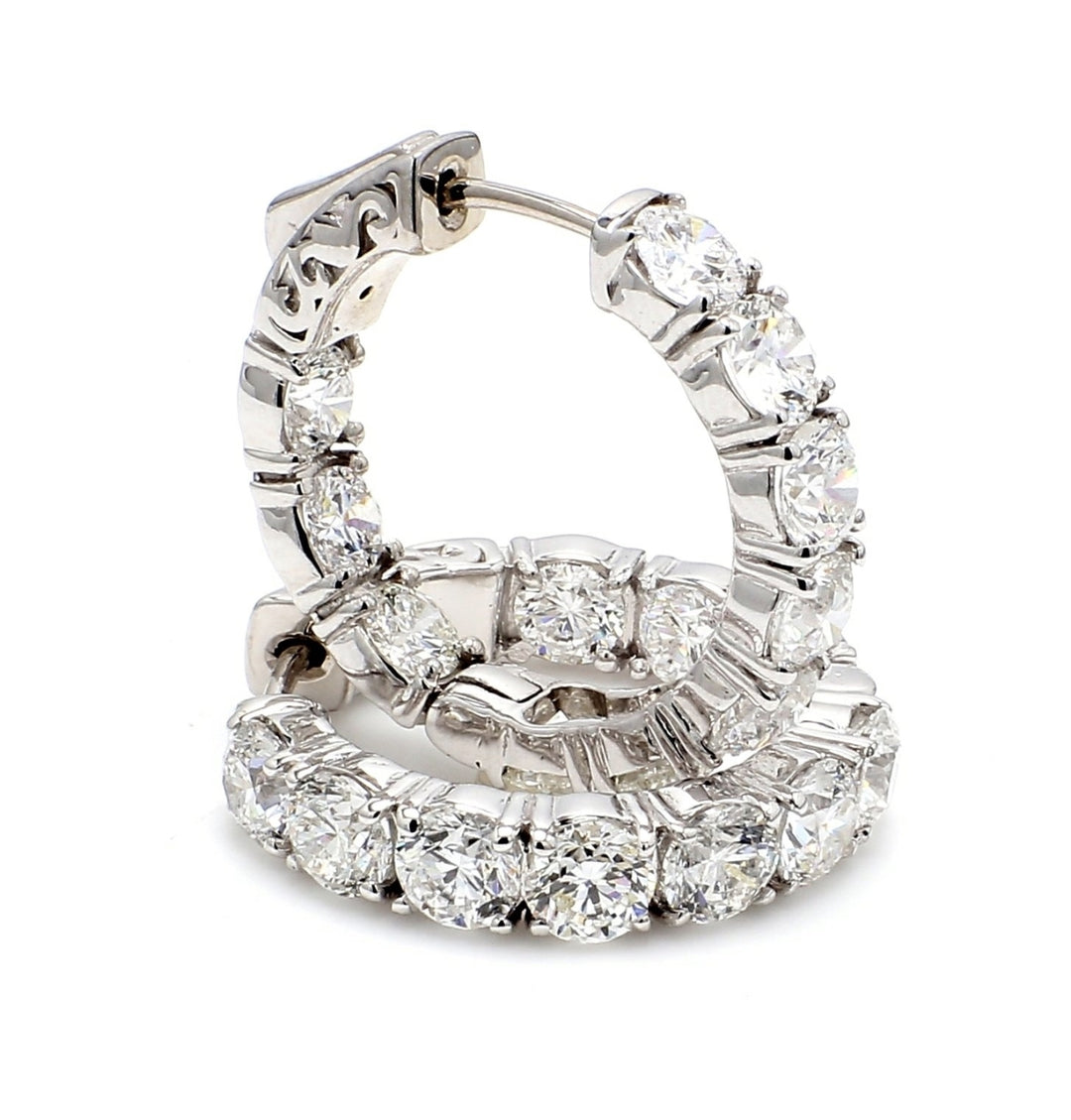 0.75"" Inside out hoop earrings with 4-prong set (20) round diamonds & with special spring lock.  D5.31ct.t.w.