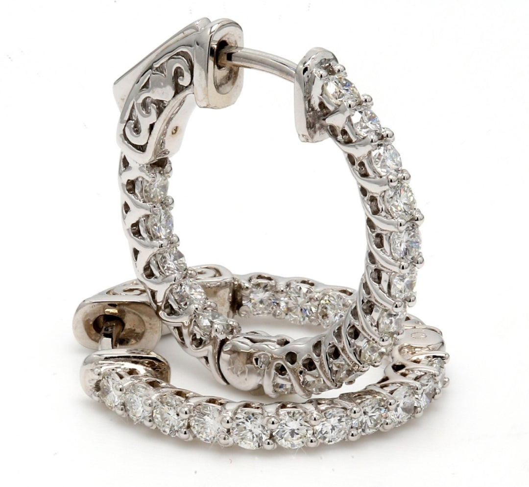 0.75"" Inside out hoop earrings with shared prong set (38) round diamonds & with special spring lock.  D0.85ct.t.w.