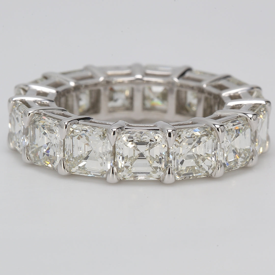 Eternity band in platinum with basket shared prong set H-I/VS+ (15) asscher cut diamonds.  D11.02ct.t.w.  Size 6.25