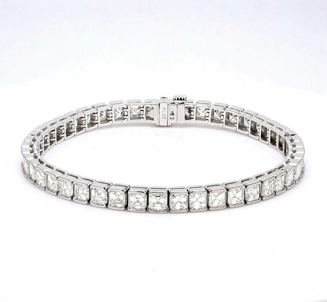 7"" Tennis bracelet in platinum with half bezel set asscher cut diamonds.  D12.30ct.t.w.