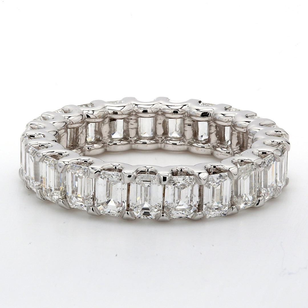 Eternity band with U-prong set (23) emerald cut diamonds.  D3.71ct.t.w.  Size 6