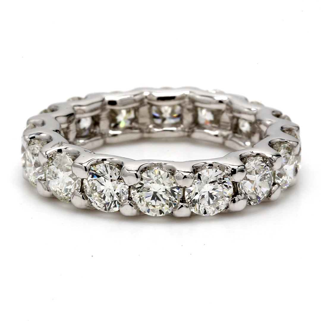 Eternity band in Platinum with U-prong set (16) round diamonds.  D2.99ct.t.w.  Size 4.25