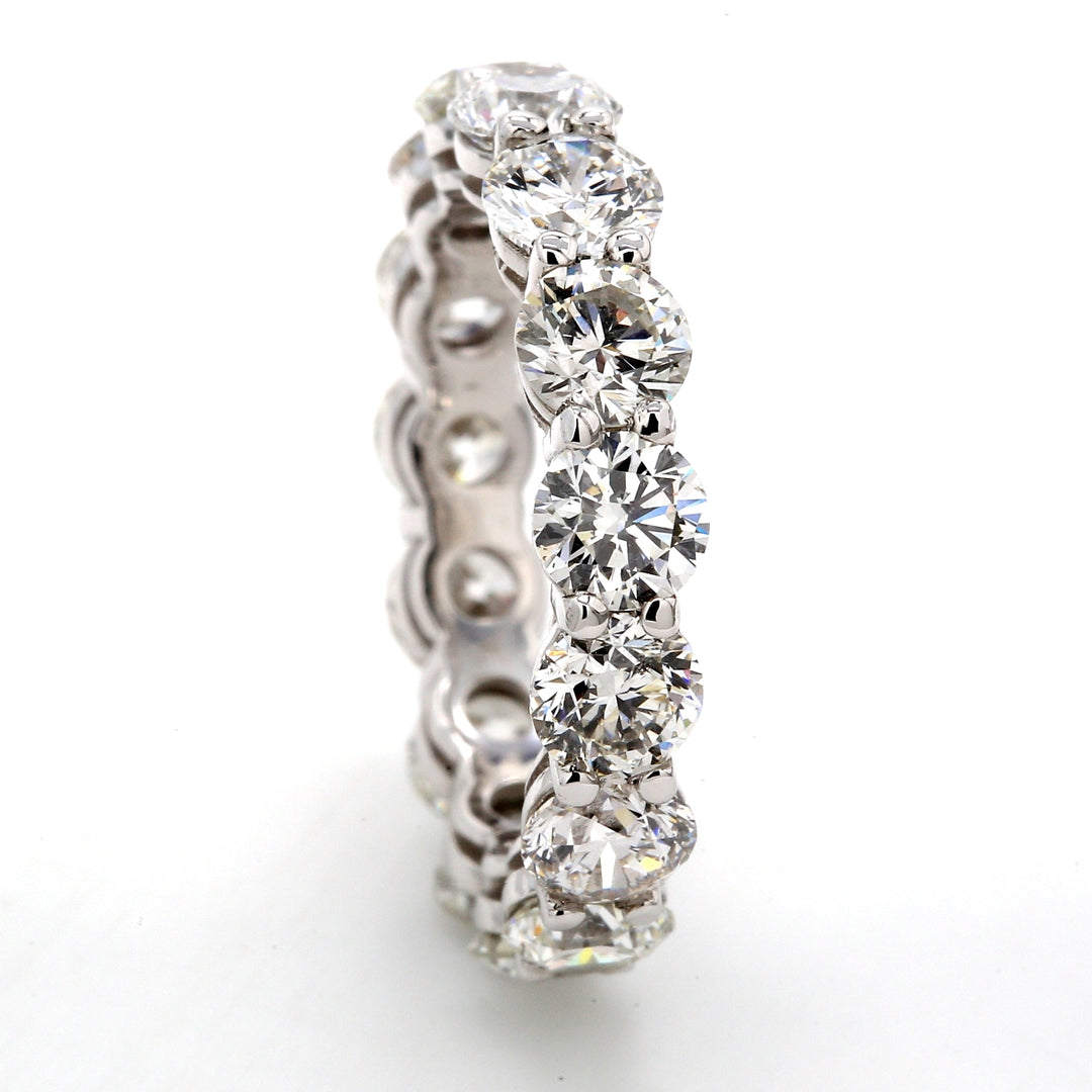 Eternity band in platinum with shared prong set (15) round diamonds.  D4.62ct.t.w.  Size 5.25