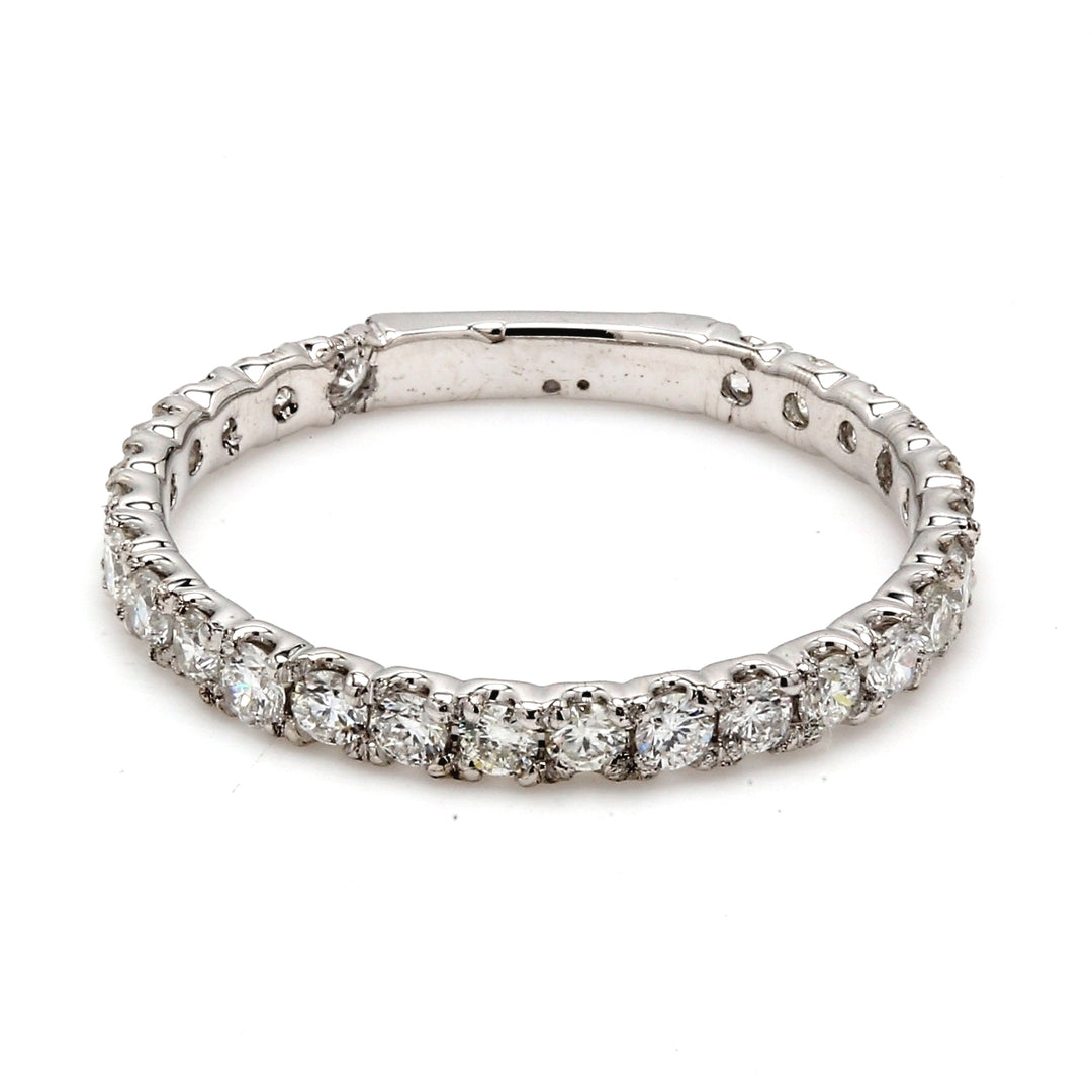 Band with 4-prong set (26) round diamonds.  D0.64ct.t.w.