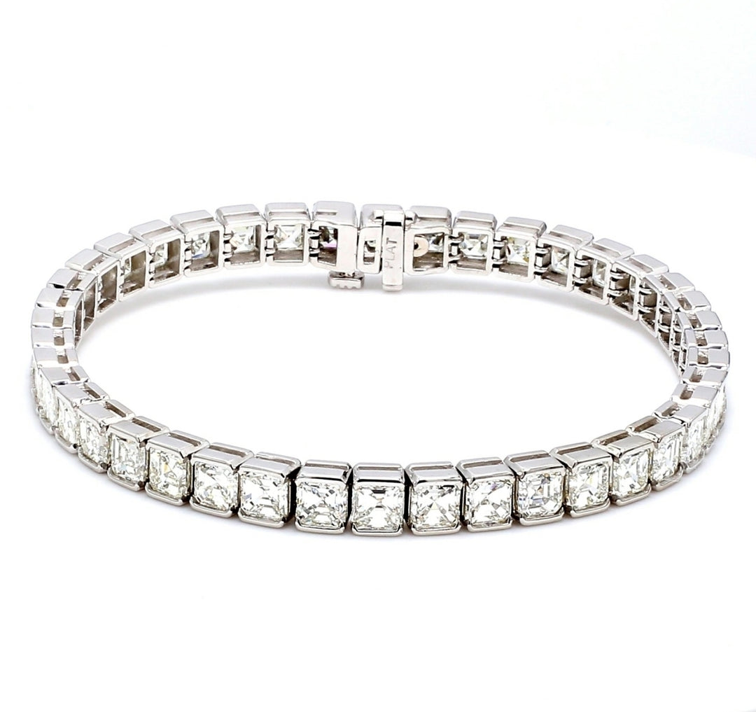 Tennis bracelet in platinum with half bezel set H-I/VS asscher cut diamonds.  D13.76ct.t.w.