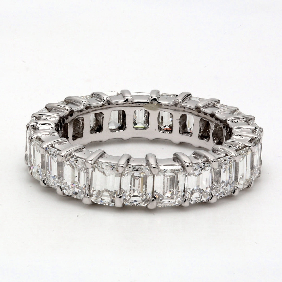 Eternity band with shared prong set E-F/VVS-VS (23) emerald cut diamonds.  D4.46ct.t.w.  Size 6