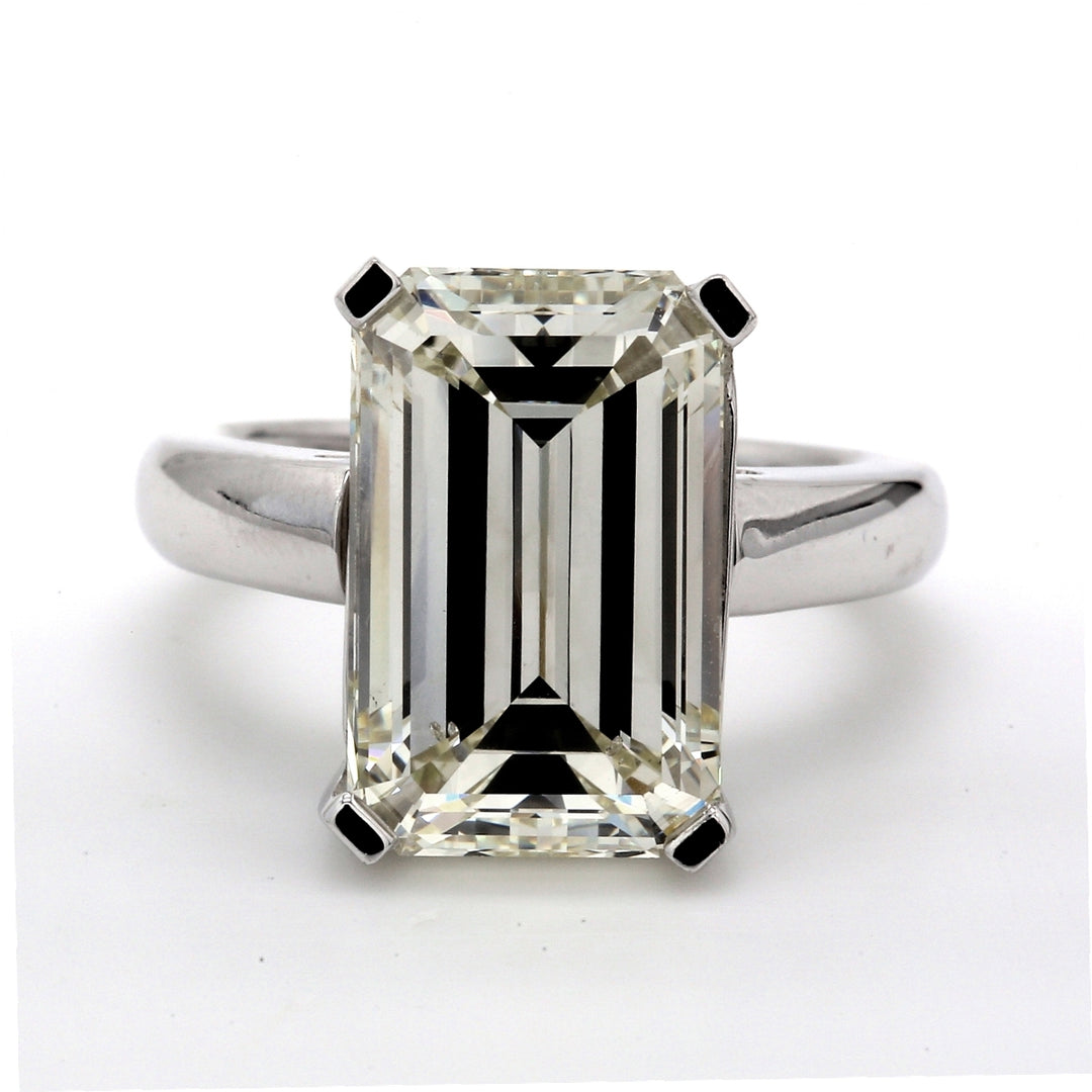 Solitaire ring with 4-prong set USA K/VS2 emerald cut diamond.  D9.01ct.tw.