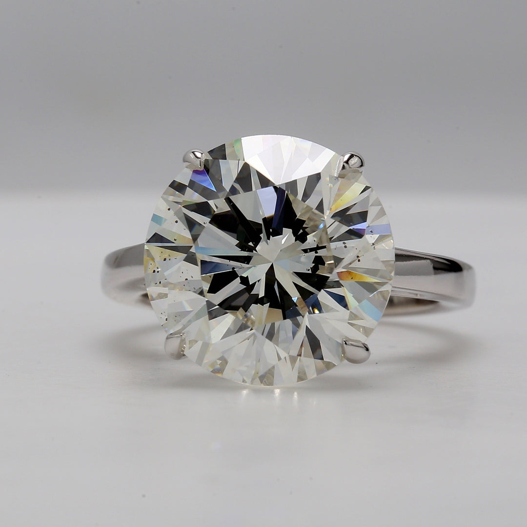 Solitaire ring in 18K WG with GIA certfied J/SI1 round diamond.  D10.01ct.t.w.