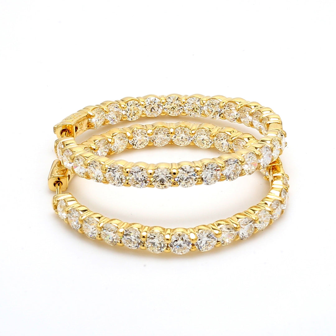 1.5"" Inside out hoop earrings in yellow gold with shared prong set (50) round diamonds & with special spring lock.  D11.57ct.t.w.