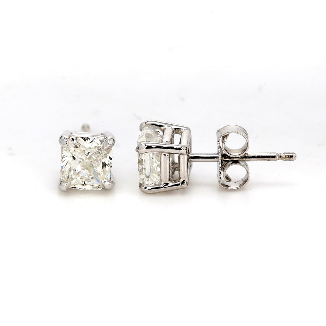 Push back stud earrings with 4-prong set GIA certified H/VS1 cushion cut diamonds.  D1.24ct.t.w.