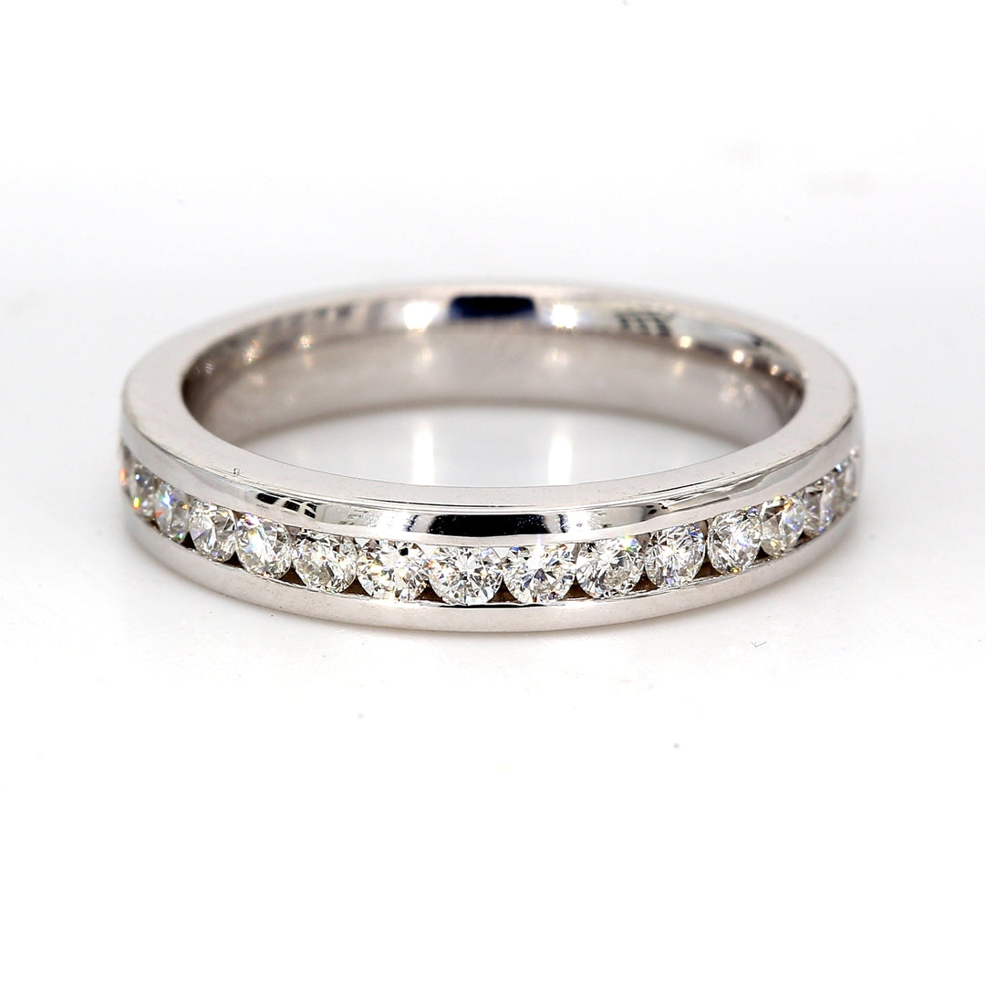 Band with channel set round diamonds.  D0.72ct.t.w.