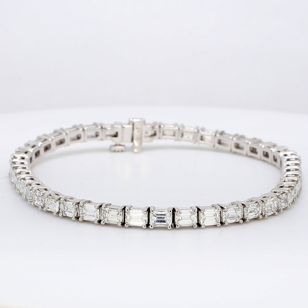 7"" Tennis bracelet east to west style in platinum with prong set emerald cut diamonds.  D8.12ct.t.w.