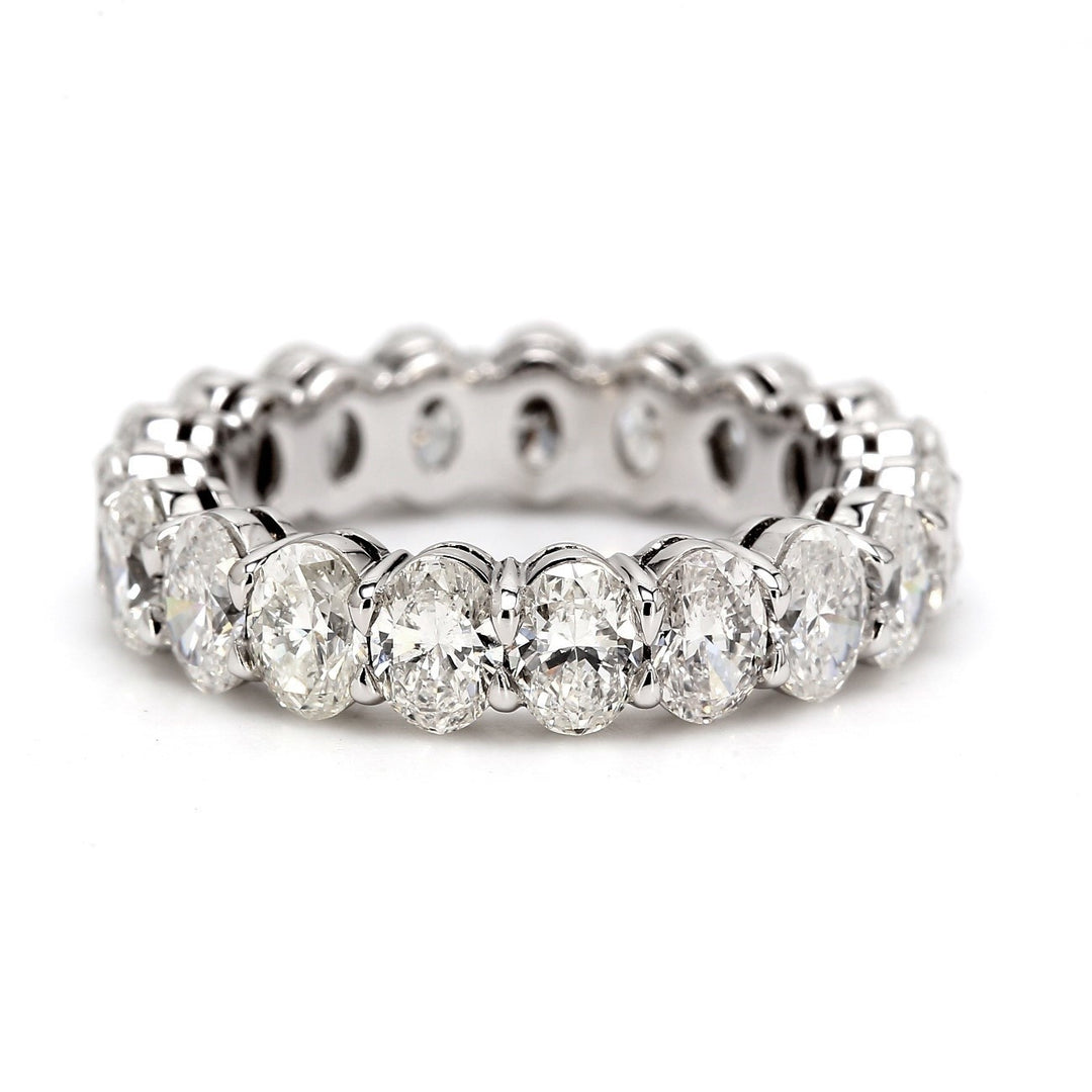 Eternity band in platinum with shared prong set (18) oval diamonds.  D4.30ct.t.w.  Size 5