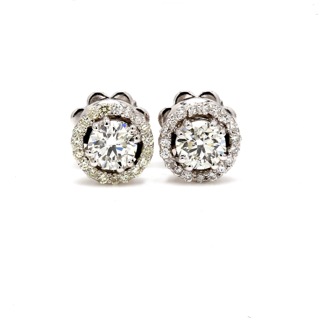 Push back stud earrings with earring jacket & shared prong set round diamonds.  D0.54ct.t.w.