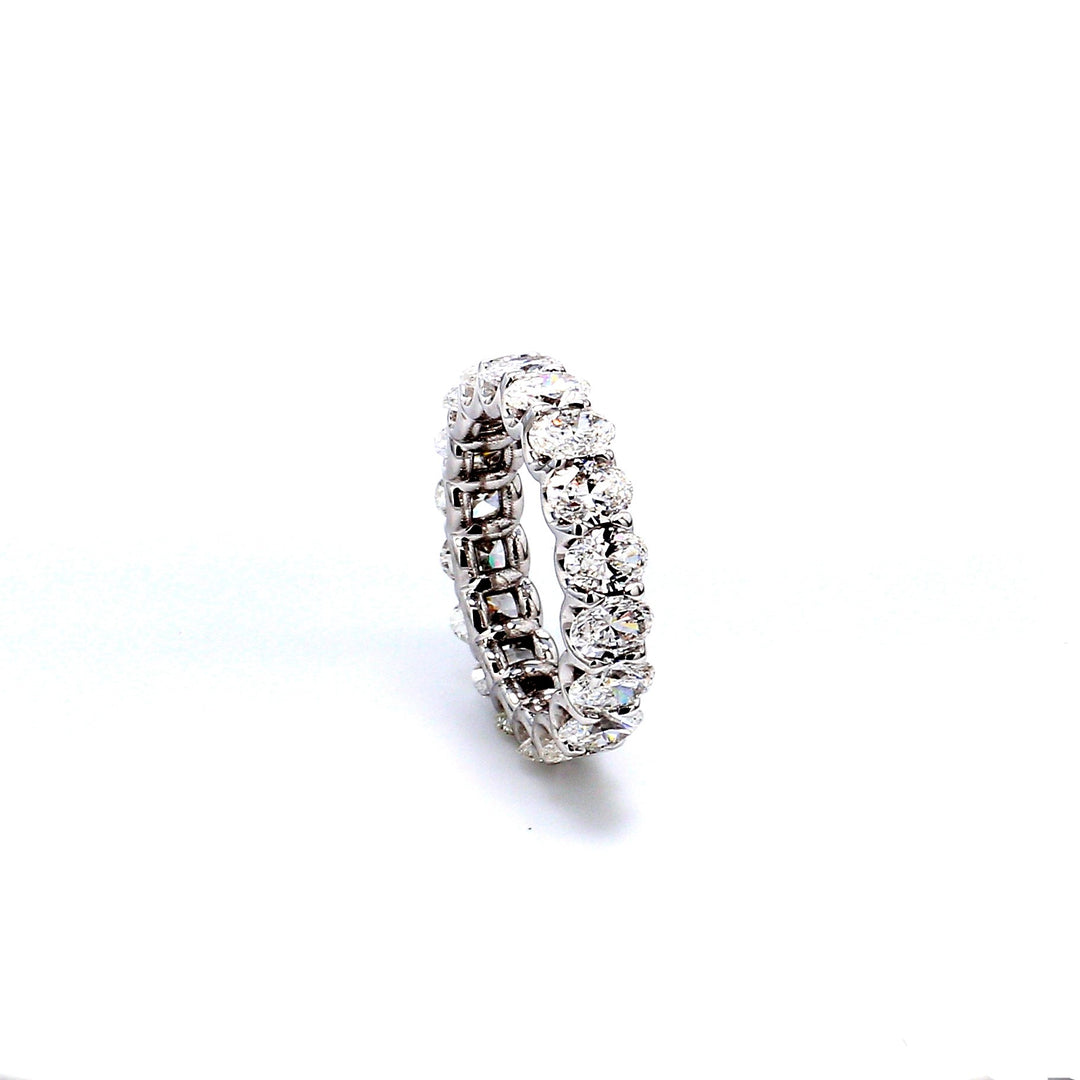 Eternity band with shared U-prong set (18) oval diamonds.  D4.41ct.t.w.  Size 5.5