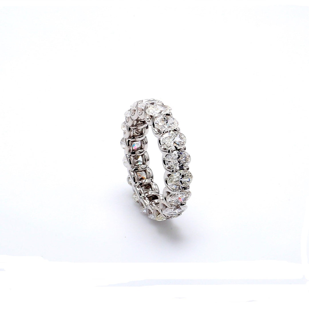 Eternity band with shared U-prong set (18) oval cut diamonds.  D4.72ct.t.w.  Size 6