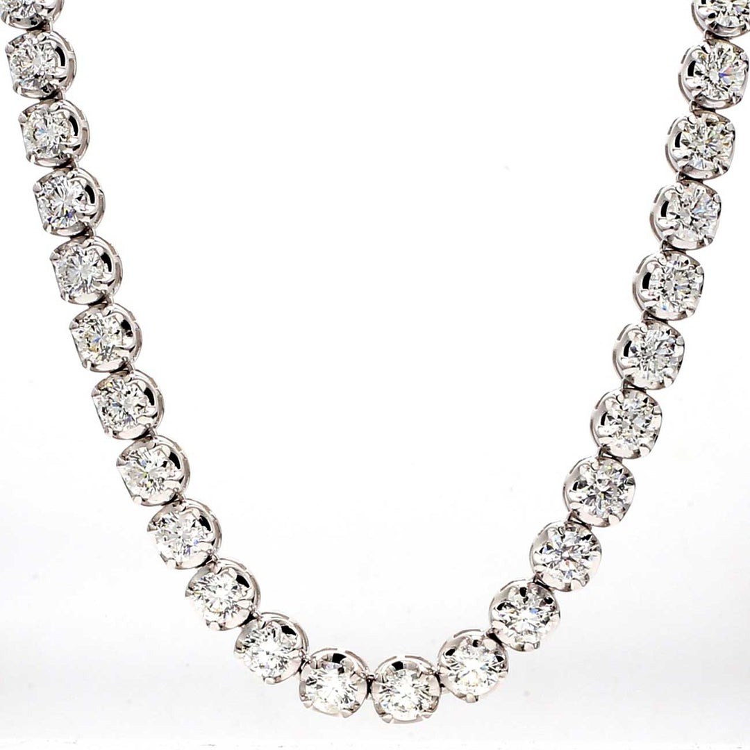 17"" Tennis necklace in 18K WG with illusion crown head 4-prong set (74) round diamonds.  D22.60ct.t.w.