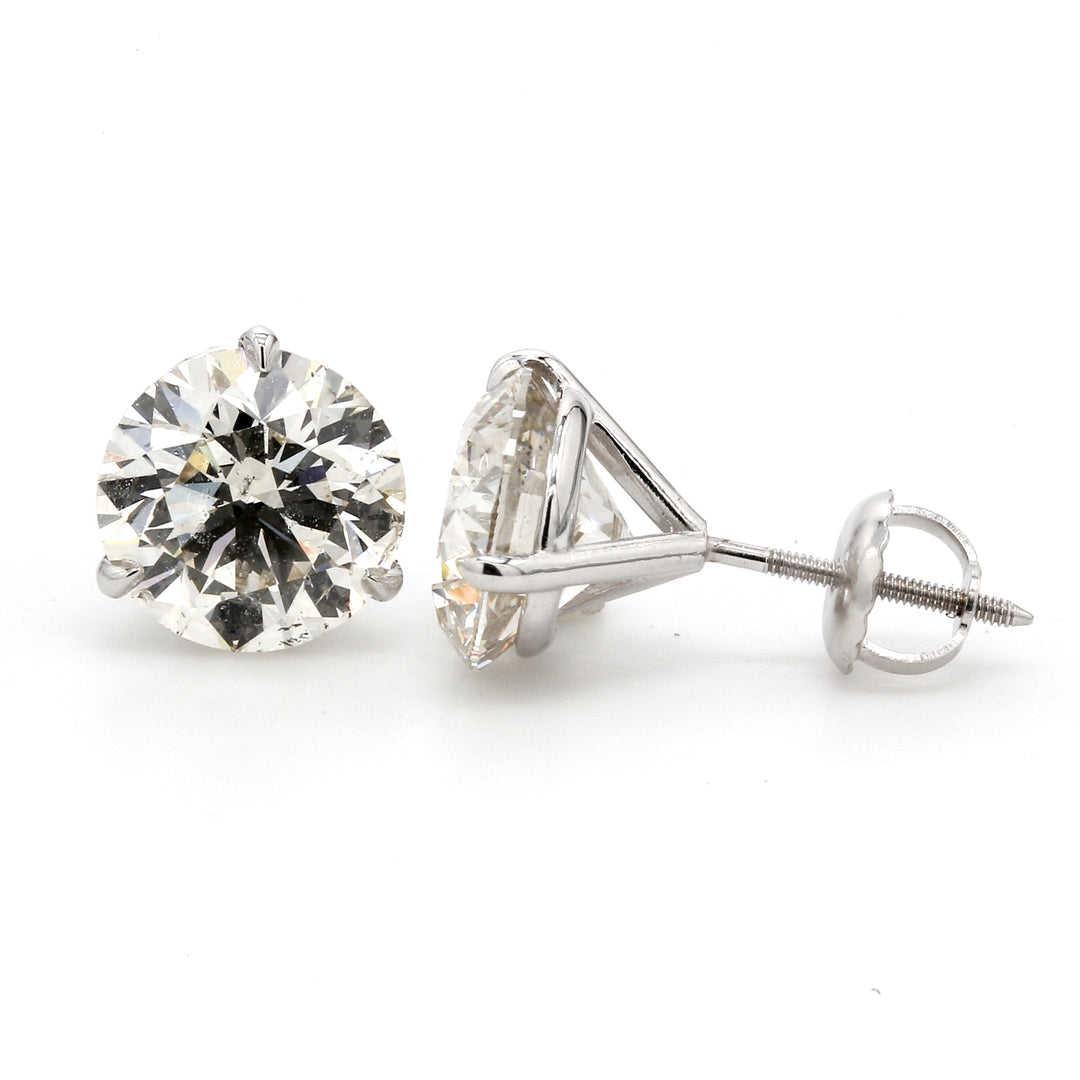 Screw back stud earrings with 3-prong set round diamonds.  D5.00ct.t.w.