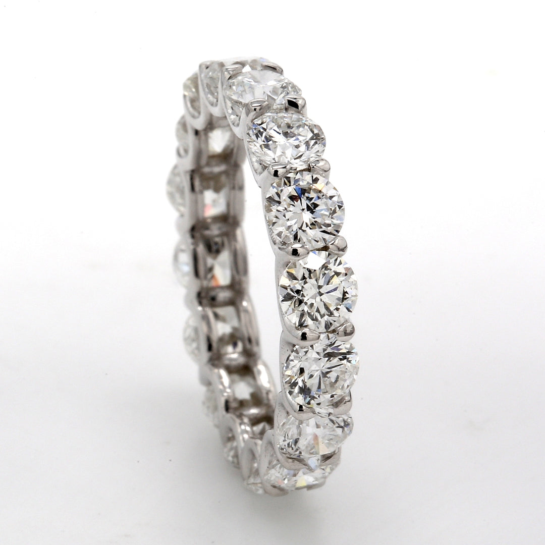 Eternity band in 18K WG with shared U-prong set (16) round diamonds.  D3.73ct.t.w.  Size 5