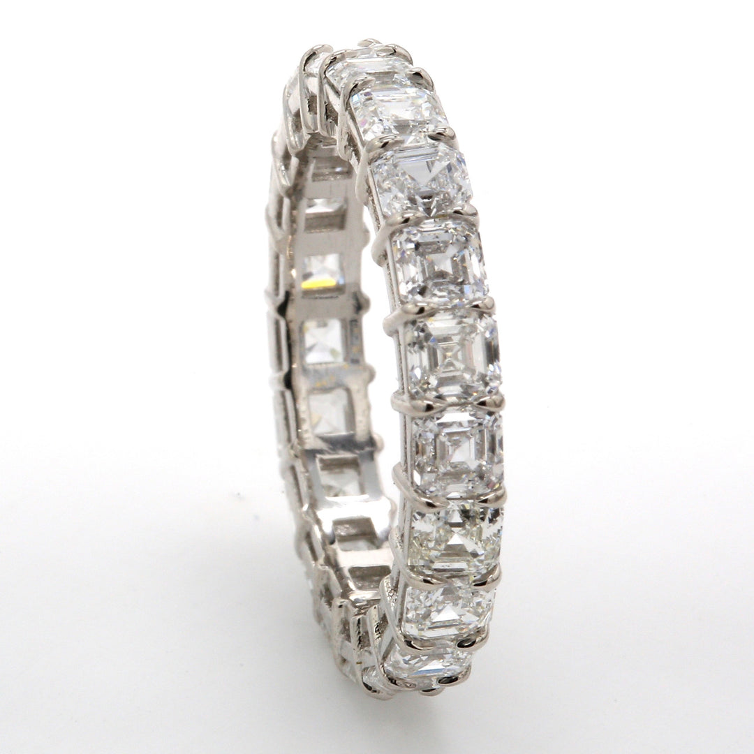 Eternity band in platinum with basket prong set (21) asscher cut diamonds.  D4.11ct.t.w.  Size 6