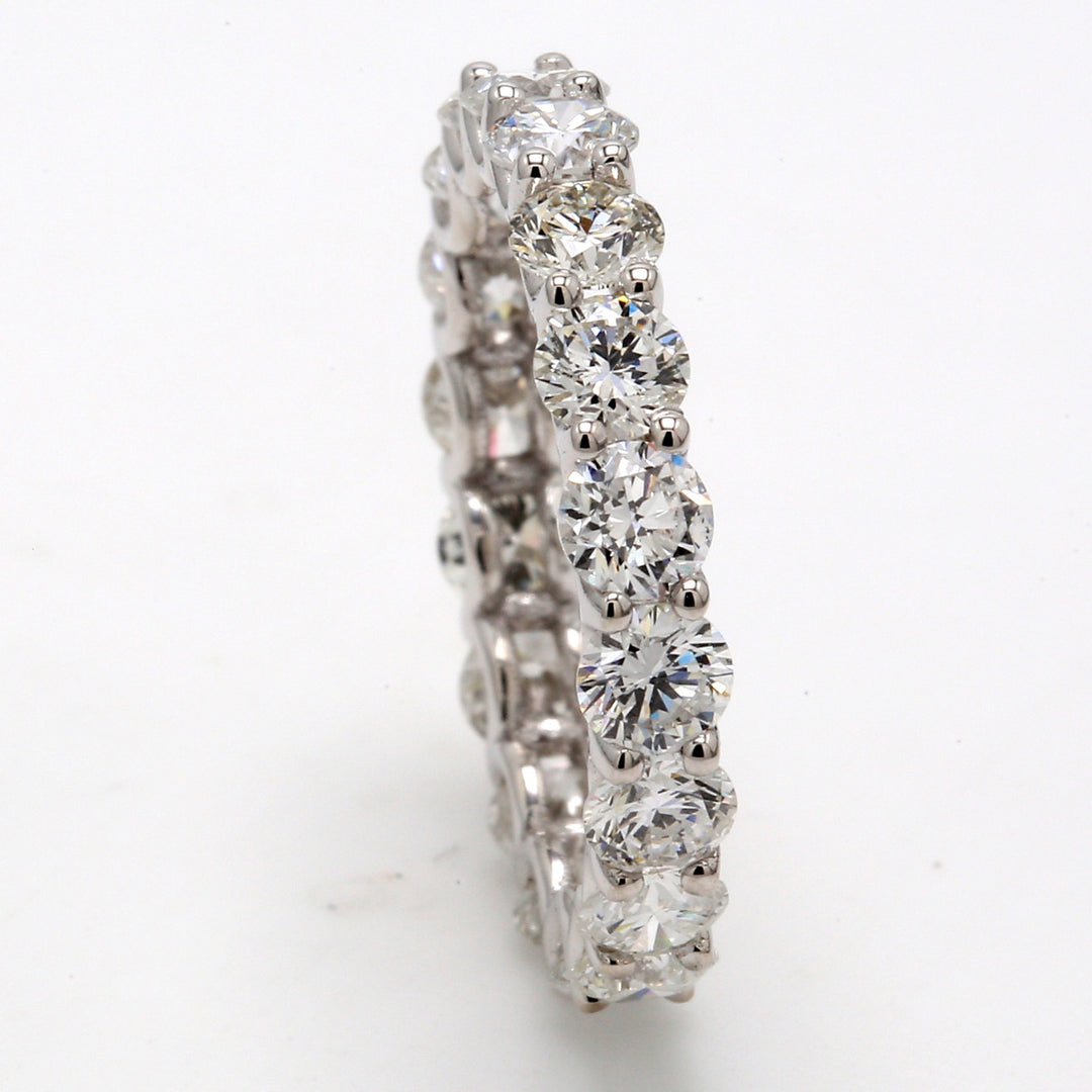 Eternity band in 18K WG with U-prong set (18) round diamonds.  D2.64ct.t.w.  Size 4.75