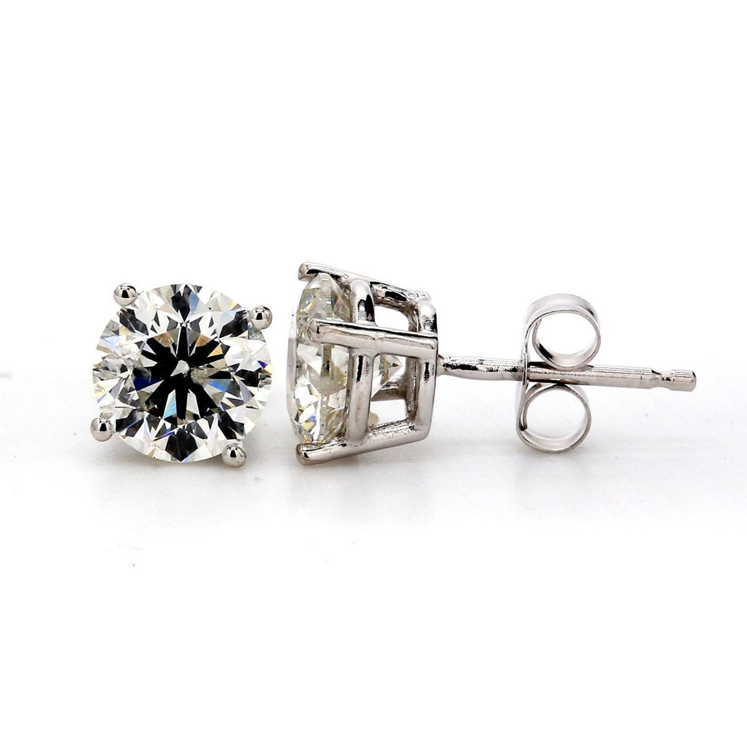 Push back stud earrings with 4-prong set USA certified J/SI2-SI3 round diamonds.  D4.03ct.t.w.