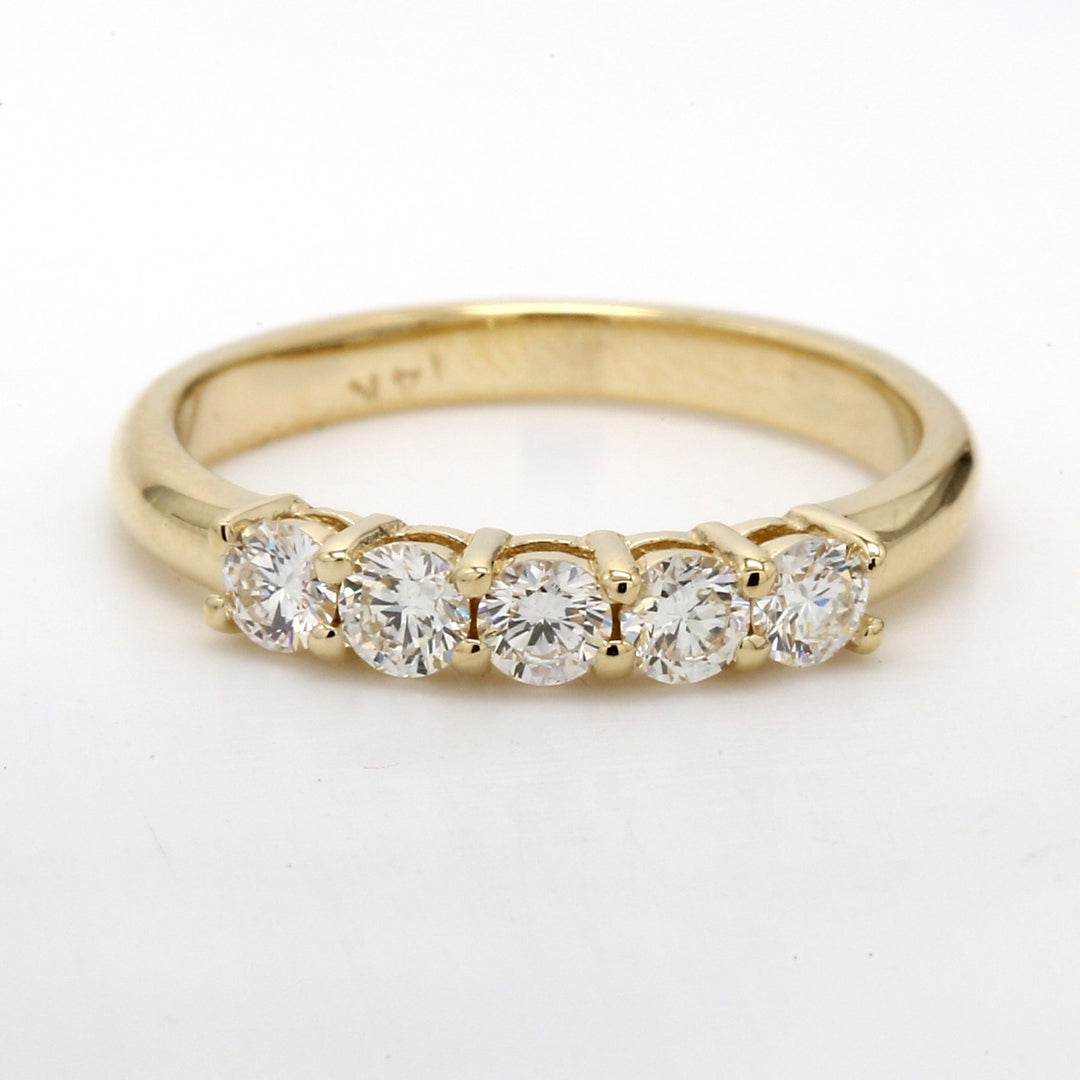 5-stone band in 14K YG with shared U-prong set round diamonds.  D0.55ct.t.w.  Size 6.5