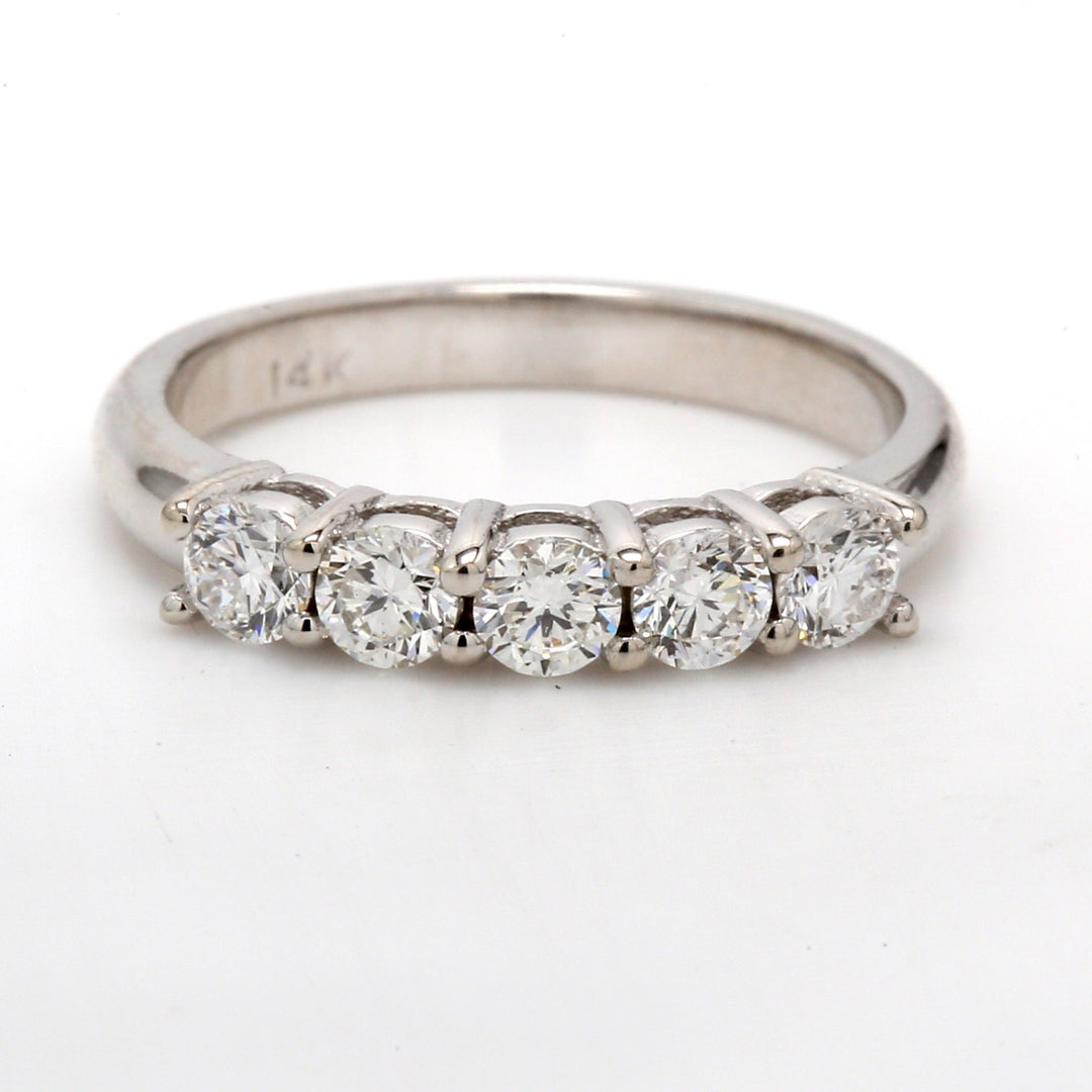 5- stone band with shared U-prong set round diamonds.  D0.71ct.t.w.  Size 6.25