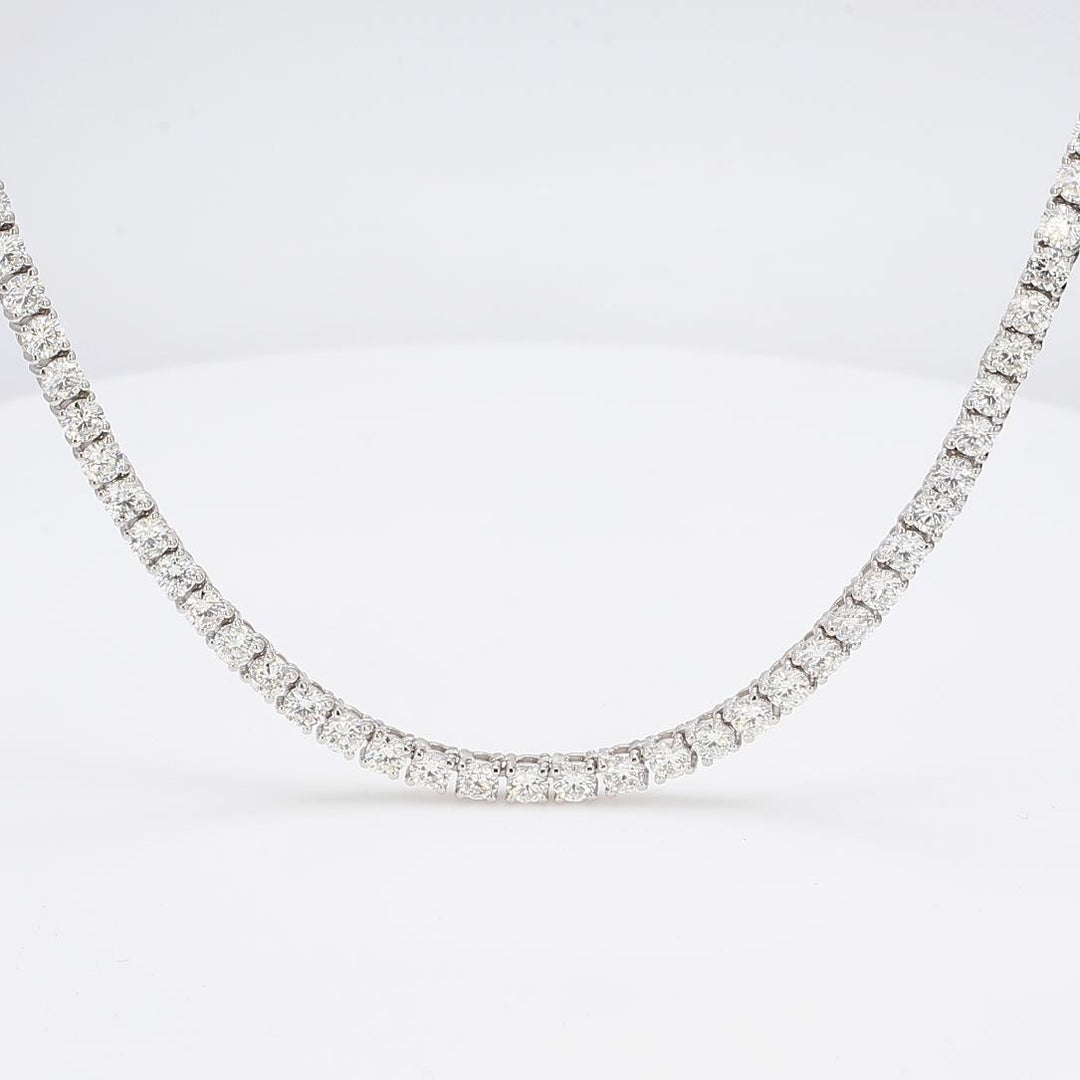 20"" Tennis necklace with 4-prong set (211) round diamonds.  D6.98ct.t.w.