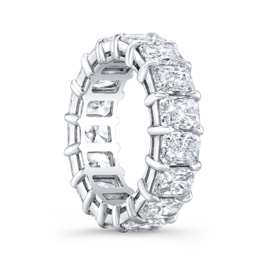 Eternity band in platinum with basket claw set (17) radiant cut diamonds.  D9.02ct.t.w.  Size 7