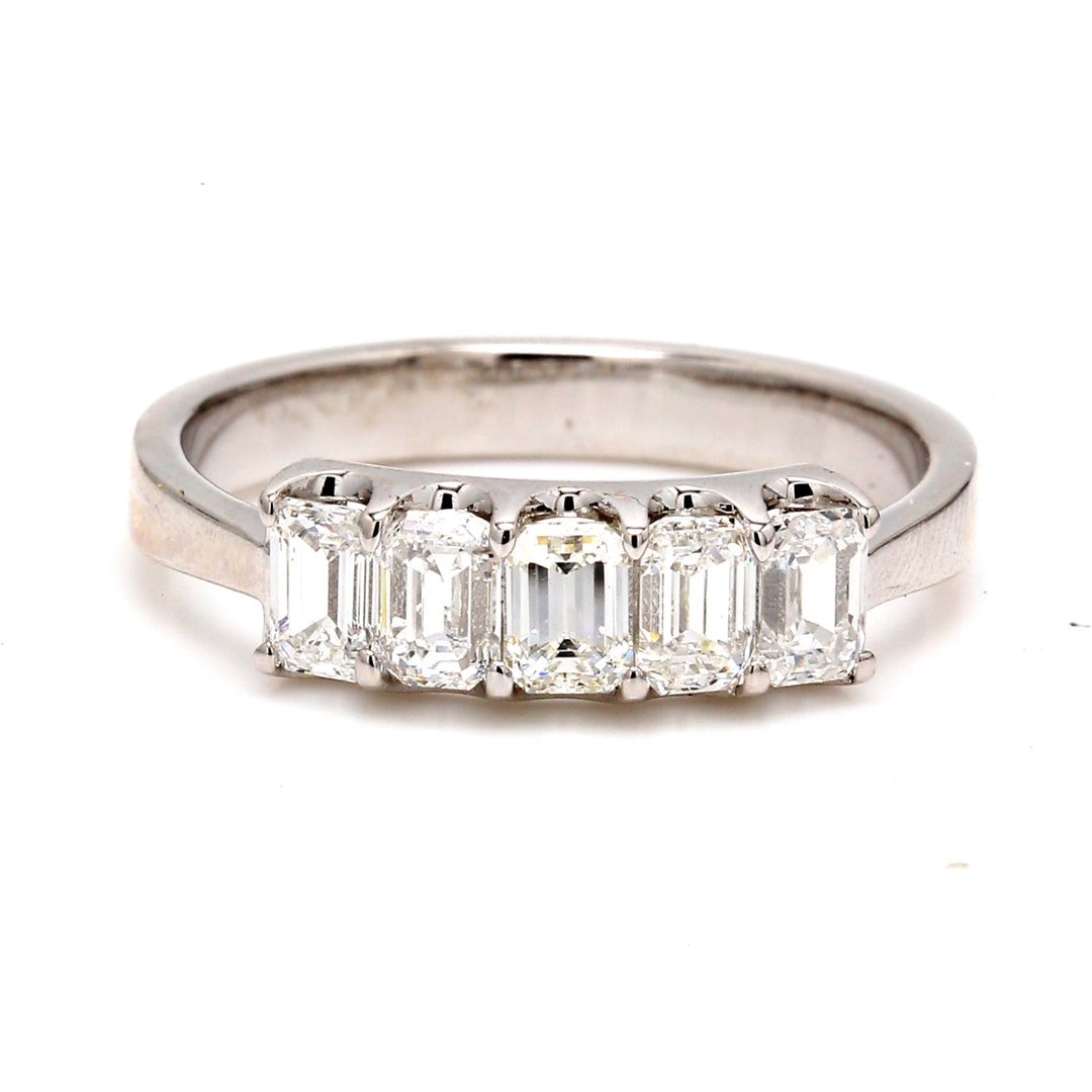 5-stone band in platinum with U-prong set emerald cut diamonds.  D1.11ct.t.w.  Size 6.5