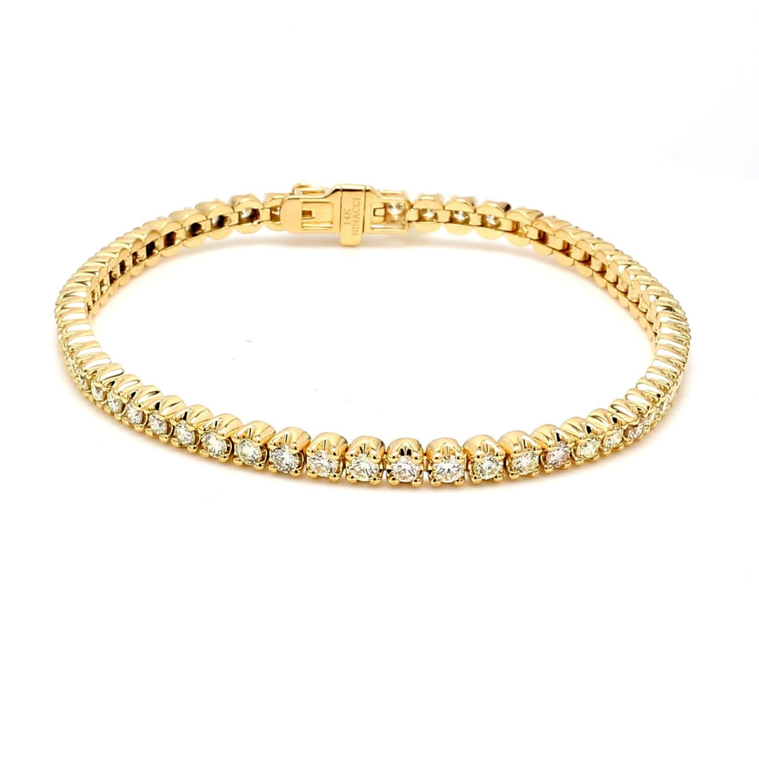 7"" Tennis bracelet in 14K YG with crown head set (60) round diamonds.  D2.98ct.t.w.