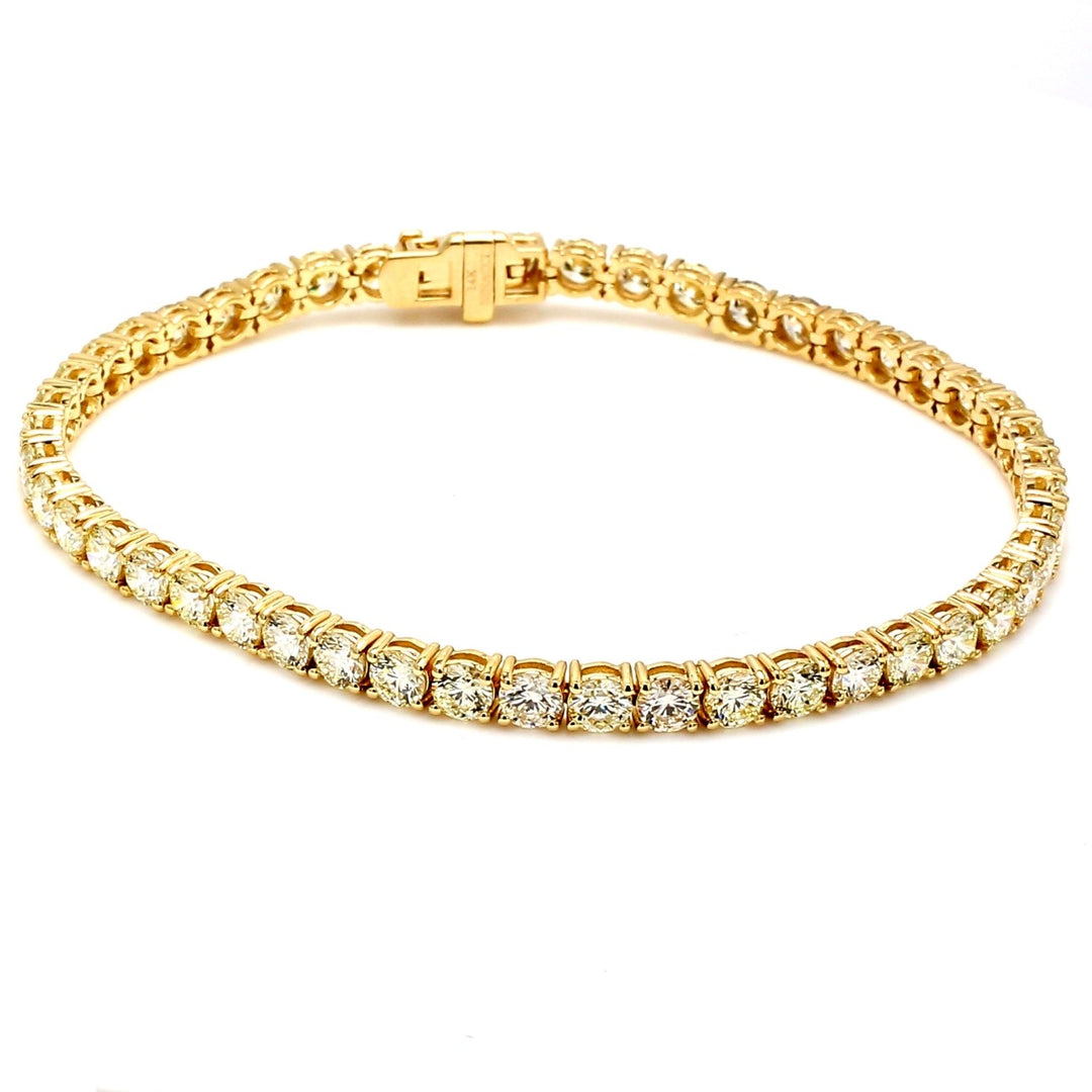 7"" Tennis bracelet with basket prong set (48) round diamonds.  D7.74ct.t.w.