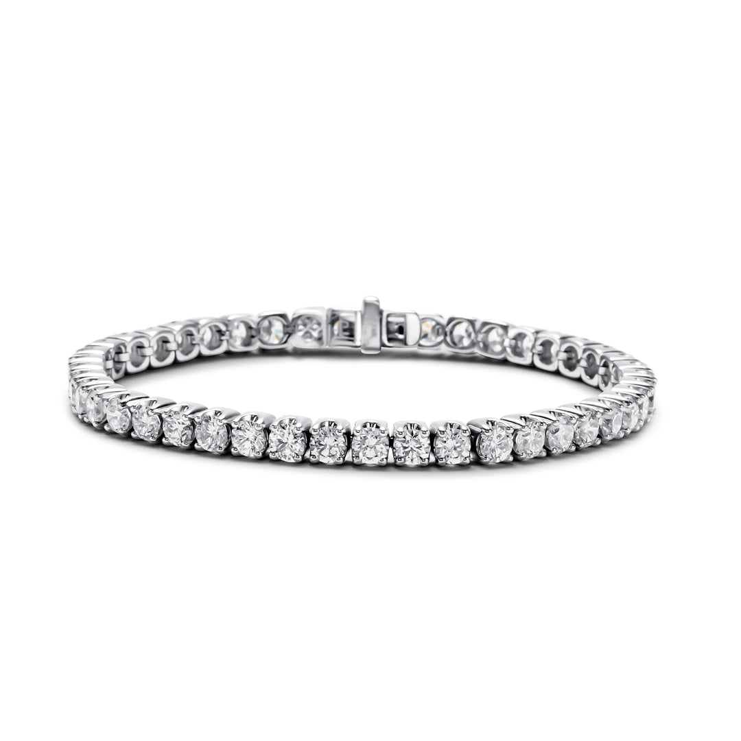 7"" Tennis bracelet with crown head prong set (45) round diamonds.  D9.00ct.t.w.